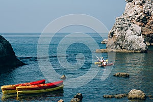 Kayaks at sea. Tourist kayaking in the sea near Dubrovnik, Croat