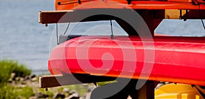 Kayaks stacked outdoor on beach