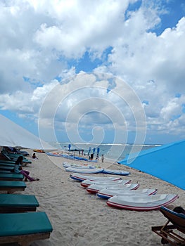 Kayaks on white sandy beach