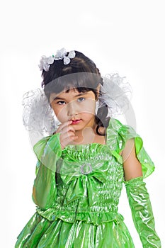 Kazakh girl of 5-6 years in a green dress