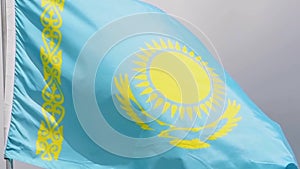 Kazakhstan flag waves in the wind in slow motion