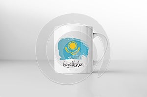 Kazakhstan flag on white coffee mug.