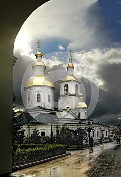 The Kazan church and the churches of the Nativity of Christ and the Virgin in the Seraphim-Diveevsky Monastery on a summer evening