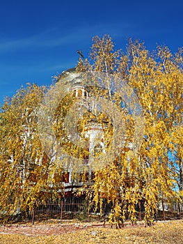 Kazan Orthodox Church in the ancient city of Petrovsk in Russia under the clear blue sky.Golden autumn, view of the temple through