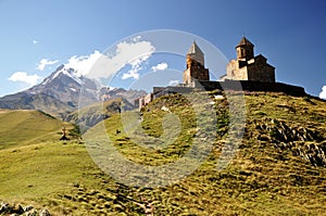Kazbeg mountain and Holy Trinity Church