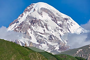 Kazbek or Kazbegi mountain,near the Gergeti Trinity Church ,village Stepantsminda in Georgia ,At an altitude of 2170 meters,