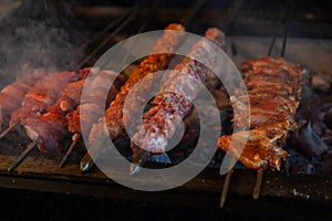 Kebabs cooking on a grill