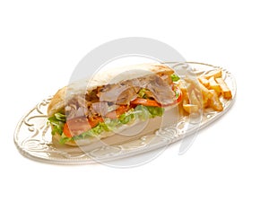 Kebap sandwich on dish photo