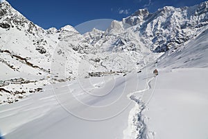 Kedarnath temple trek covered with snow in Himalaya.