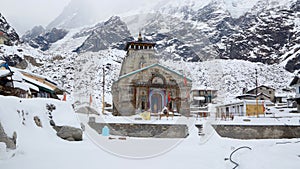 Kedarnath temple during winter and snow fall in Uttarakhand.