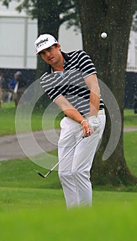 Keegan Bradley chips a shot