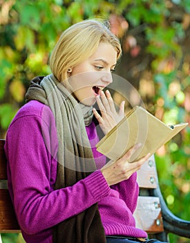 Keen on reading. Time for review. further education. i learn for myself. woman read interesting book in spring park