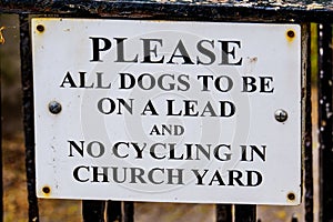 Keep all dogs on lead sign on churchyard