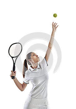 Keep calm and serve an ace. Studio shot of a female tennis player getting ready to serve the ball.