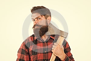 Keep calm and shave beard. Brutal lumberjack having shave with sharp axe blade isolated on white. Bearded man with