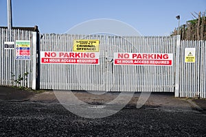 Keep clear no parking sign at building site entrance