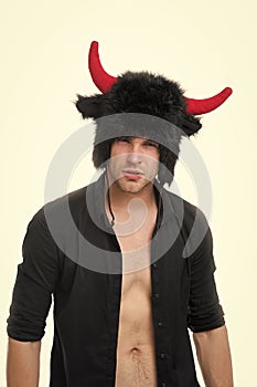 Keep cool and maintain composure. Man horns as devil or bull. Ignore provocation. Aggressive intimidating and photo