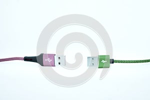 Keep distance.Two USB cable on the white background.