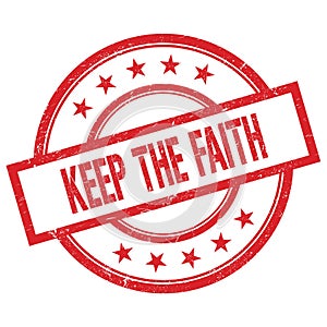 KEEP THE FAITH text written on red vintage round stamp