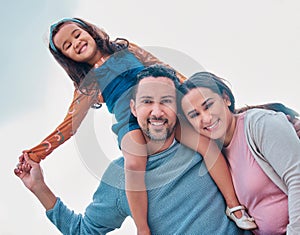 Always keep the family close. a young family spending time together in a park.