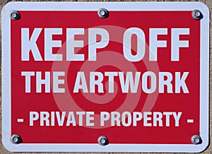 Keep Off the Artwork sign.