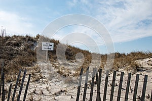 Keep off the dunes sign posted in Sand Dunes