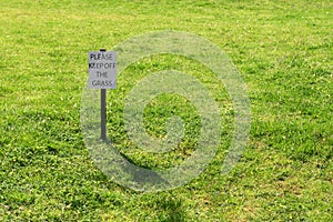 Keep off grass sign