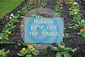 Keep off the grass sign