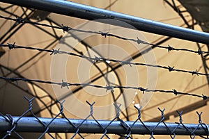 Keep Out! Secure enclosure with barbed wire fence