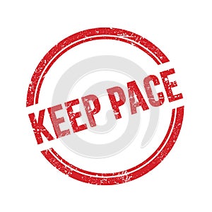 KEEP PACE text written on red grungy round stamp