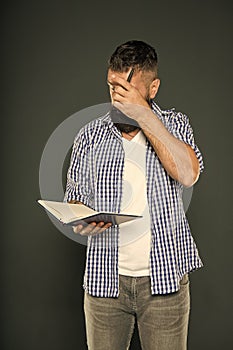 Keep reading, knowledge is power. Bearded man reading book on grey background. Univesity student reading for information