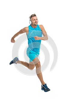 Keep running. Feel the rhythm. Motivational song. Man sportsman running with headphones. Runner handsome strong guy