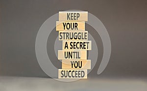 Keep secret symbol. Concept words Keep your struggle a secret until you succeed on wooden blocks. Beautiful grey table grey