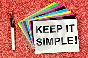 Keep it simple! The inscription of the concept of inspiration on colored stickers.