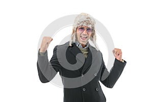 Keep yourself warm. happy unshaven man in coat and earflap hat. confident and handsome guy feel comfortable. charismatic