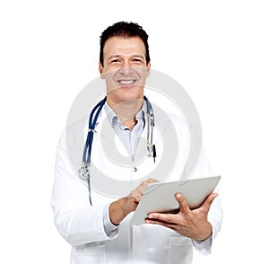 Keeping abreast on medical developments. Studio portrait of a smiling doctor holding a digital tablet and smiling at the