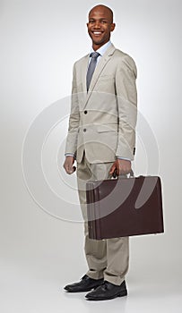 Keeping his work close. Portrait of a successful businessman holding a briefcase.