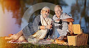 Keeping the romance alive. a happy senior couple enjoying a picnic outdoors.
