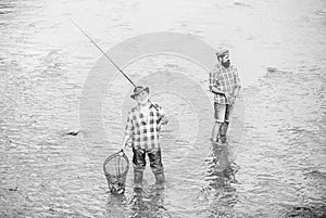 Keeping together is progress. sport activity. Trout bait. summer weekend. mature men fisher. male friendship. family