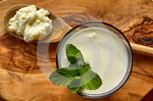 Kefir enriched with some mint leaves photo