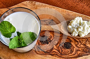 Close-up shot on a full glass of white Kefir photo