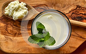 Kefir enriched with some mint leaves photo