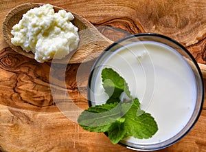 Close-up shot on a full glass of white Kefir photo