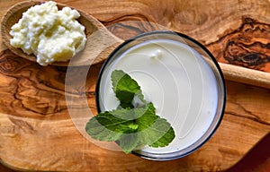 Kefir enriched with some mint leaves photo