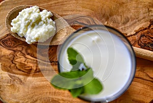 Kefir enriched with some mint leaves photo