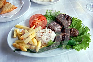 Kefte (lamb chops) with rice and French fries
