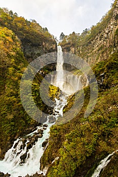 Kegon Falls one of Japans highest waterfalls in autumn at the Nikko National Park, Japan