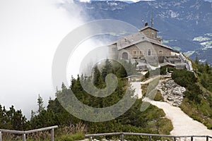 Kehlsteinhaus, Eagle Nest, Berchtesgaden in Germany, history place beautiful landscape on mountain peak with mist, cloudy