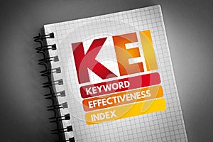 KEI - Keyword Effectiveness Index acronym on notepad, business concept background