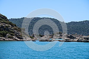 Kekova where sunken shipwrecks of Dolkisthe Antique City which was destroyed by earthquakes in the 2nd century, Tukey